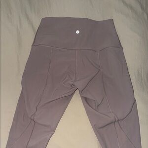 Comfy, gently used lilac lululemon leggings with scalloped legging. 25 length